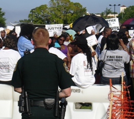 Sheriff's Deputy Keeps an Eye on Protest